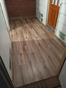 New LVP laid on a back porch during a renovation