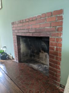 After of cleaned brick fireplace